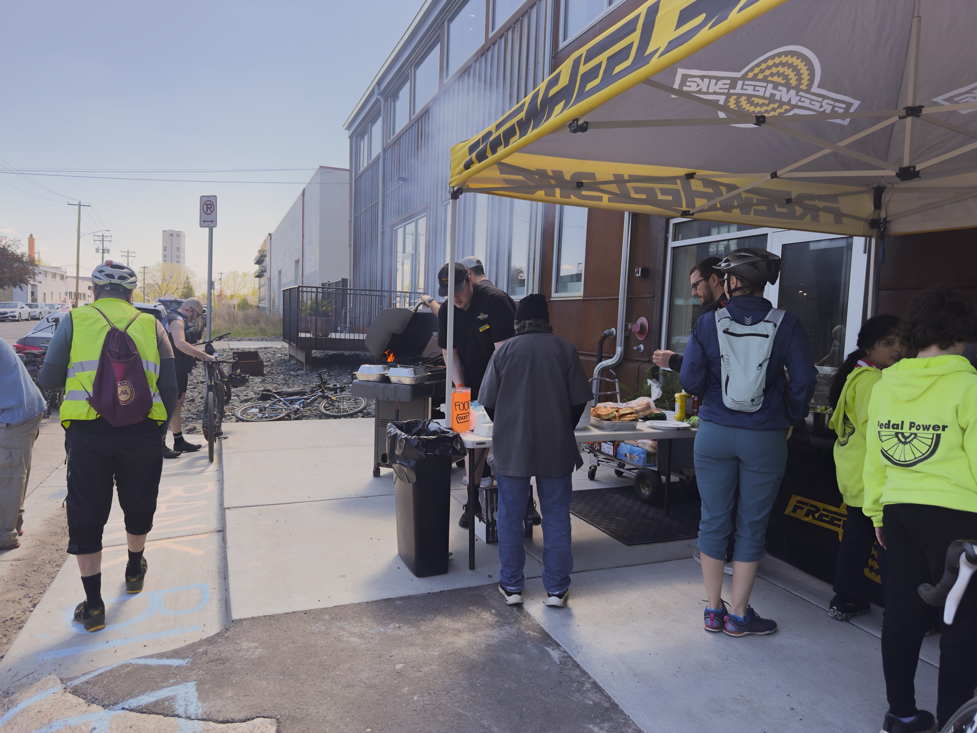 The organizers grilling burgers.
